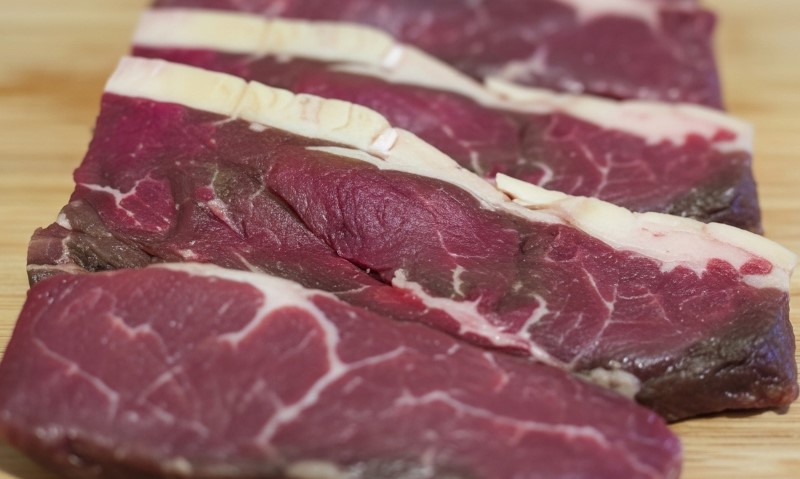 Close-up view of raw steak cuts